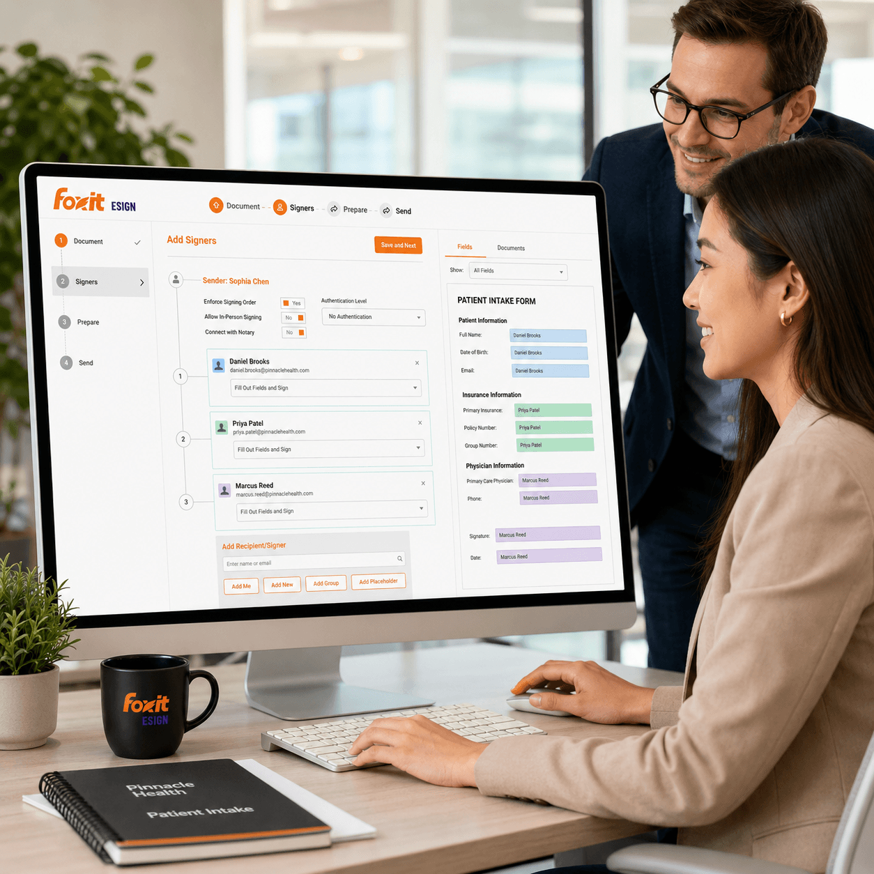 Team automating eSignature workflows on laptops